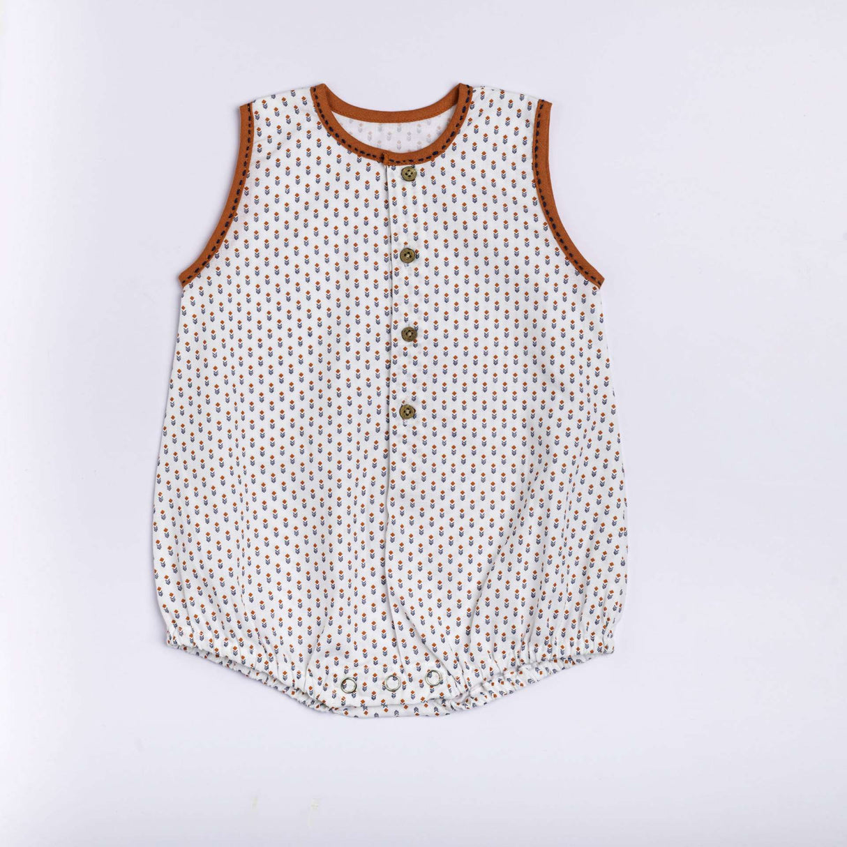 White print infant unisex onesie with orange neckline piping