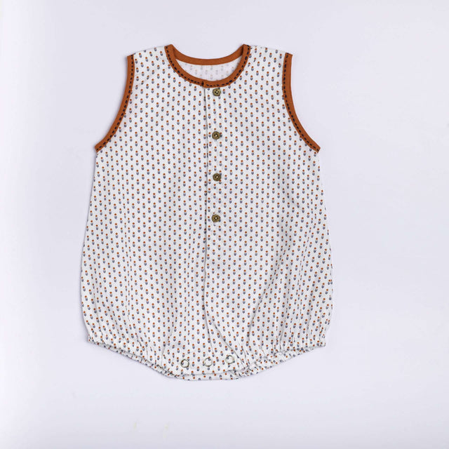 White print infant unisex onesie with orange neckline piping