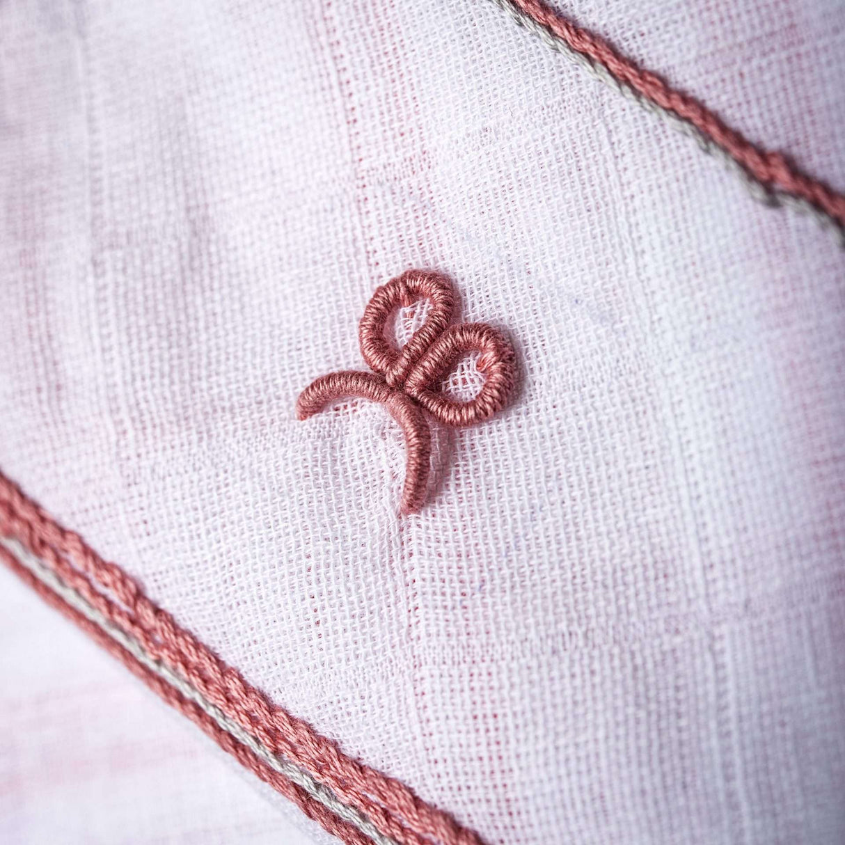 Bow bullion embroidery on a gauze base