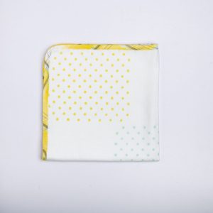 Hand block printed white gauze baby wipe with dot prints and yellow plaid piping