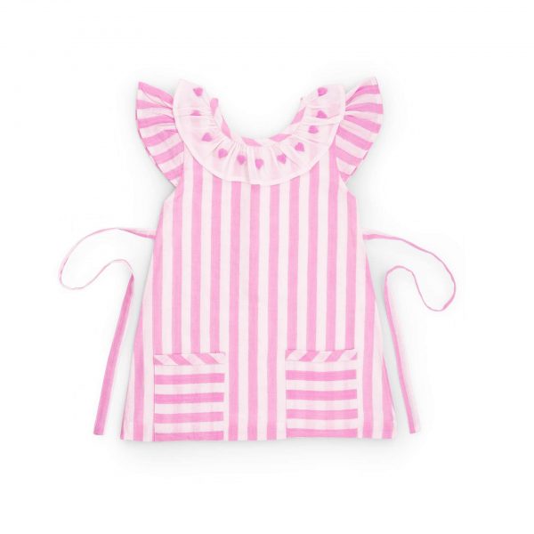 Flatlay of pink A-line dress with a white embroidered neckline ruffle with matching pink heart embroidery