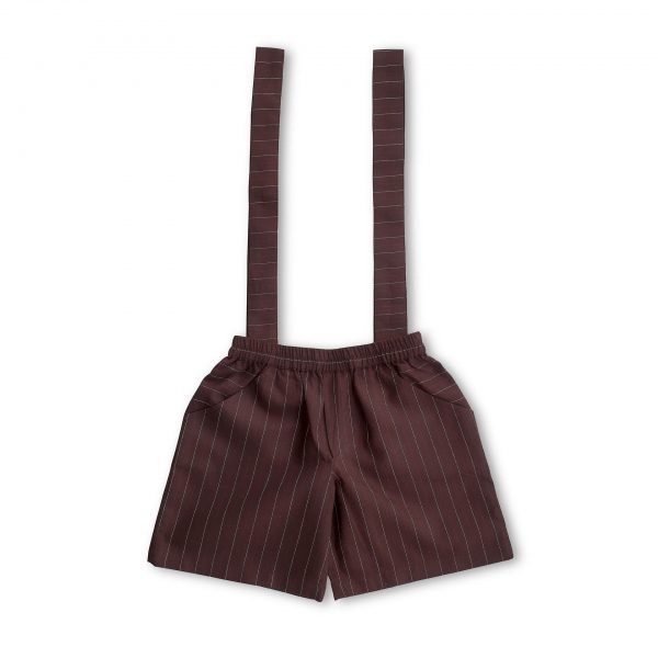 Flatlay of chocolate brown striped shorts with attached suspenders