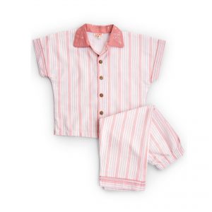 Flatlay of hand embroidered cotton pyjama set with coral stripes in soft cambric with coral trims