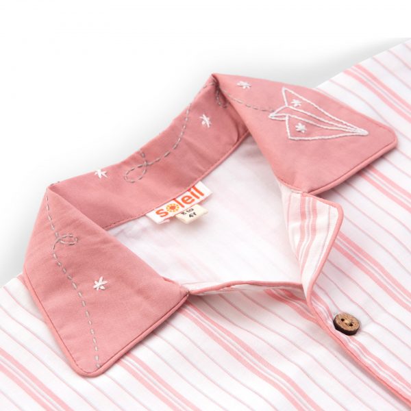 Close-up image of hand embroidered collar in striped pyjama set