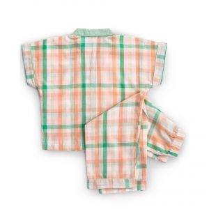 Close-up of green gingham paperbag shorts with fabric tie-up belt