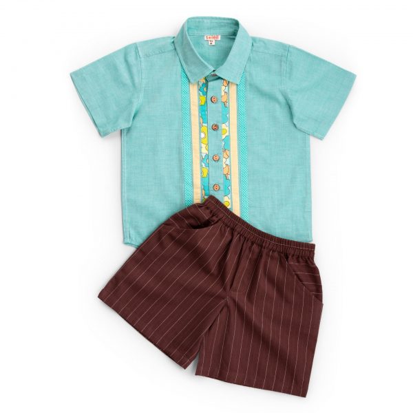 Flatlay of teal patchwork chambray shirt paired with chocolate brown shorts