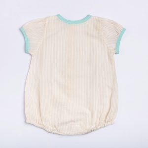 Back view of infant girl romper in a peach stripe mull with teal piping