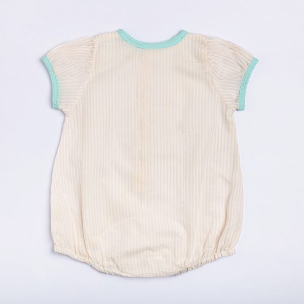 Back view of infant girl romper in a peach stripe mull with teal piping