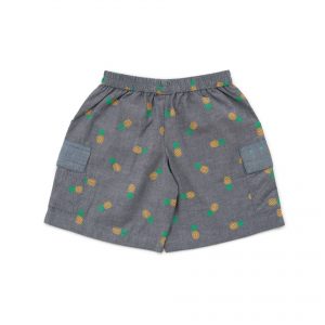 A pair of grey cotton pineapple print shorts with cargo style pockets on the side with a hand embroidered message on one of them