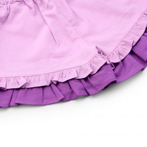 Close-up of double ruffle shorts in lavender tones