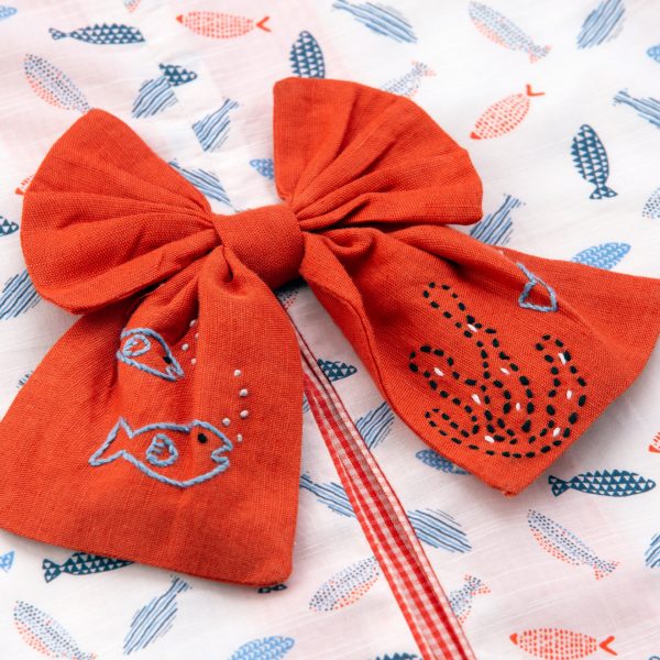 hand embroidered bow embelisshment