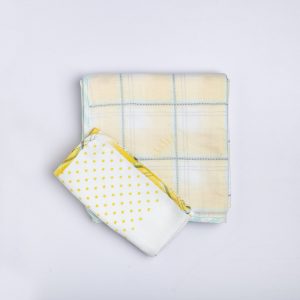 Infant wrap in 3 layers of fabric, muslin, plaid and soft double weave gauze fabric and matching burp cloth set