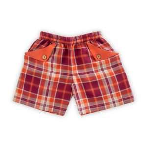 Orange plaid shorts with folded pocket flaps with wooden button embellishment