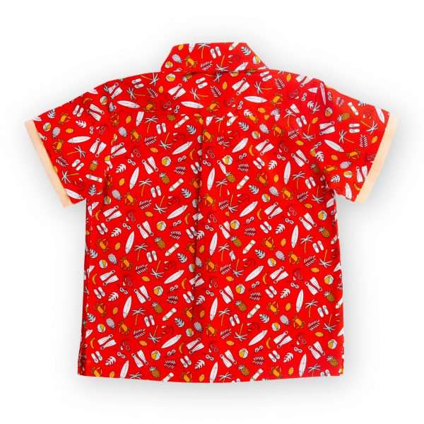 Rear image of red printed shirt with coordinated fabric bands stitched underneath the pocket and sleeve hems