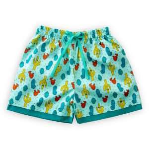 A pair of teal cactus printed shorts with a solid hem