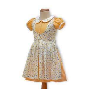 Mannequin image of orange cotton dress with a floral overdress