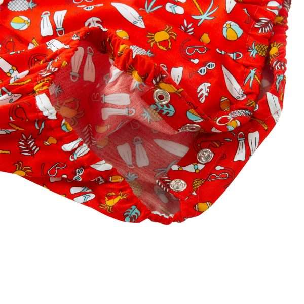 Close-up of the bottom snap buttons in red onesie with a round neckline, front button placket and an all-over fun print