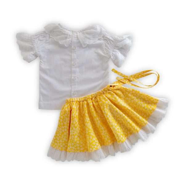 Lace edged white girls blouse and yellow floral printed girls skirt