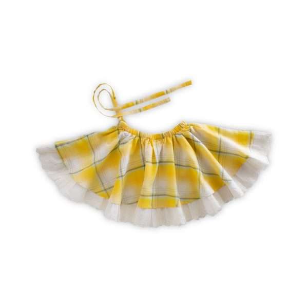 Flatlay of yellow plaid flared skirt with ruffled hem and side tie sash