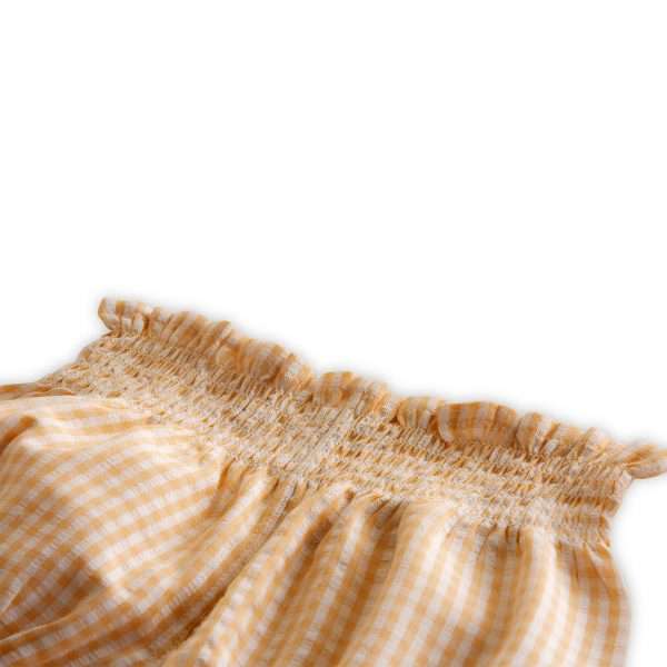 Infant bloomers withh shirred elasticated waistline in a tan gingham check