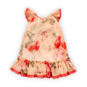 Rear image of peach floral hand smocked chiffon dress with flutter sleeves and red lace trims