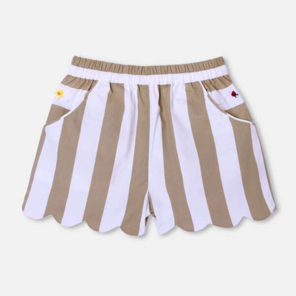 Flatlay image of scallop hem shorts in tan and white stripe with small floral pocket embroidery